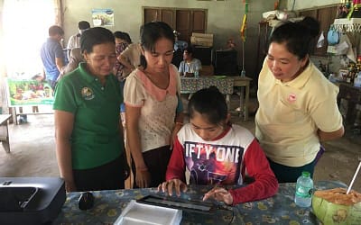 Donated PC, Printer and Reflecting Tapes to Khan Mak village in Vang Vieng